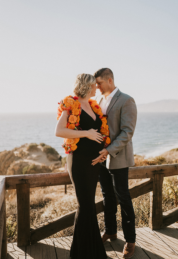 husband and pregnant wife beach maternity shoot